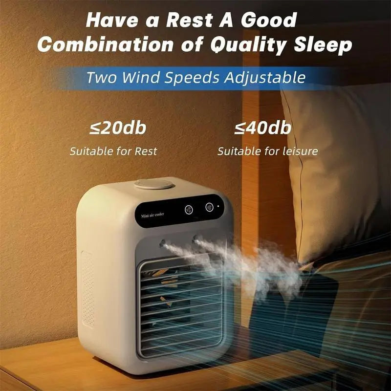 BougeRV 3-in-1 mini air conditioner on wooden table blowing cool air — cooler fan, humidifier, spray mode