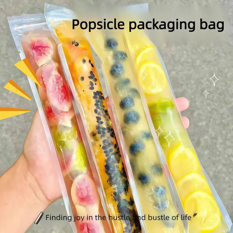 Colorful fruit popsicles in disposable bags on ice plate — lifestyle shot
