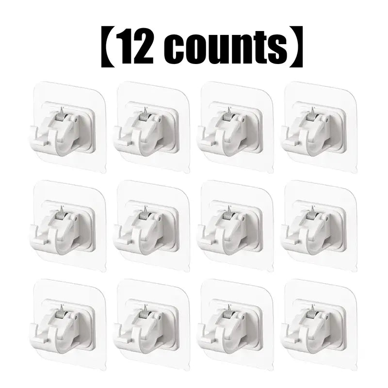 12 transparent curtain rod brackets laid out in a grid showing the full set