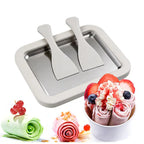 Pink ice cream roll maker with spatulas