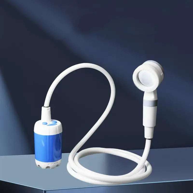 Portable electric shower pump with hose and shower head product shot